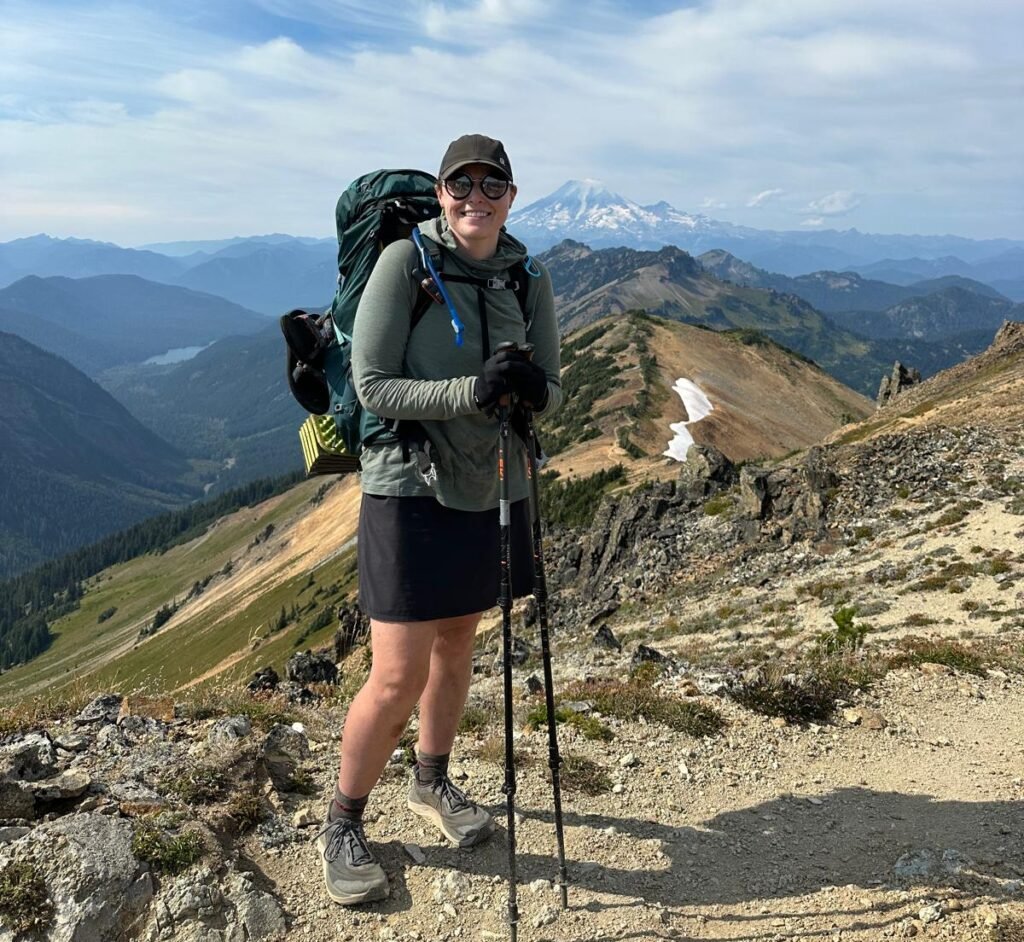 Pacific Crest Trail Hiker in Goat Rock Wilnerness with view to Mt Rainier