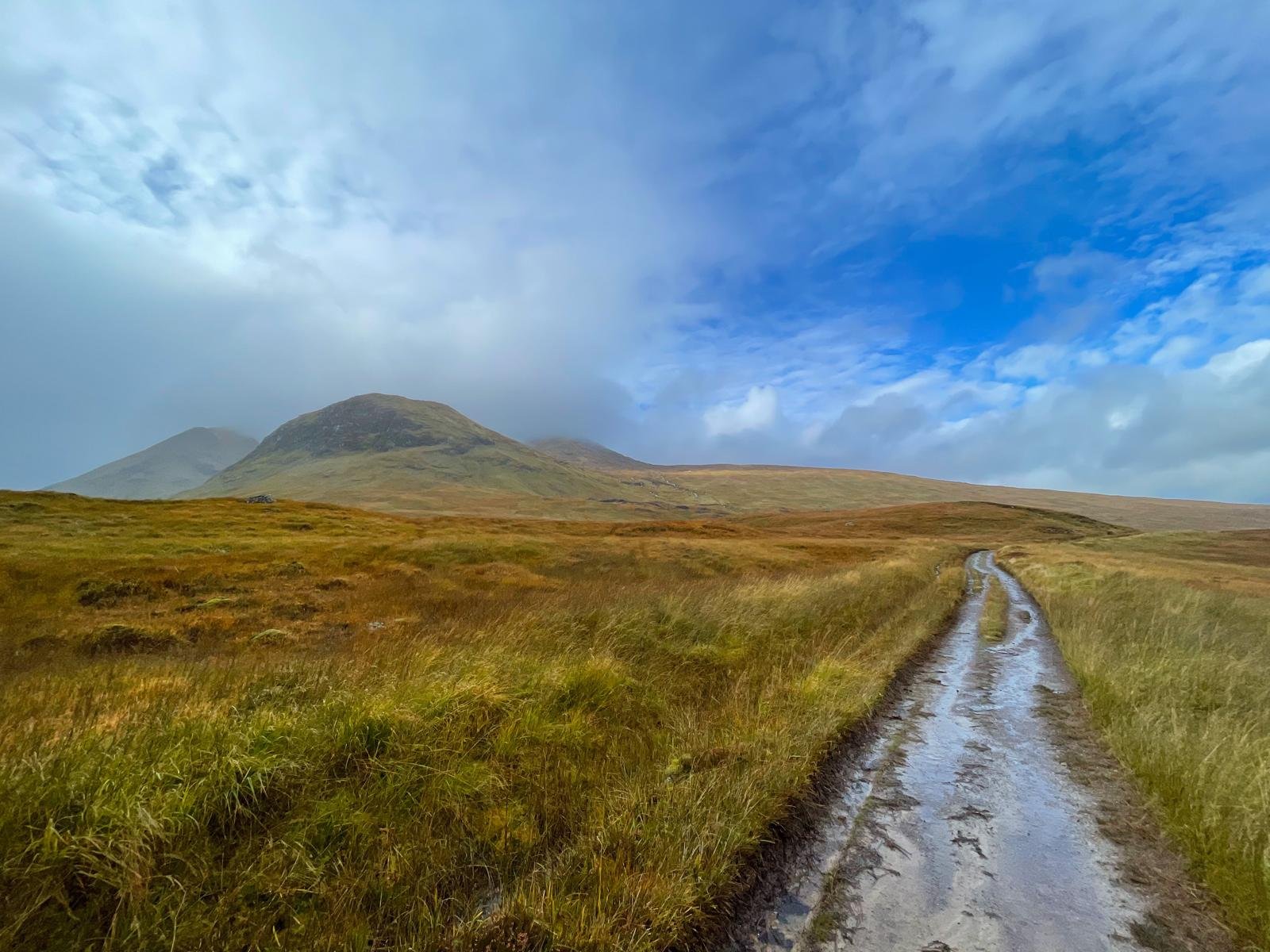 Blue skies and waterlogged paths heading through Rannoch Moor on the West Highland Way