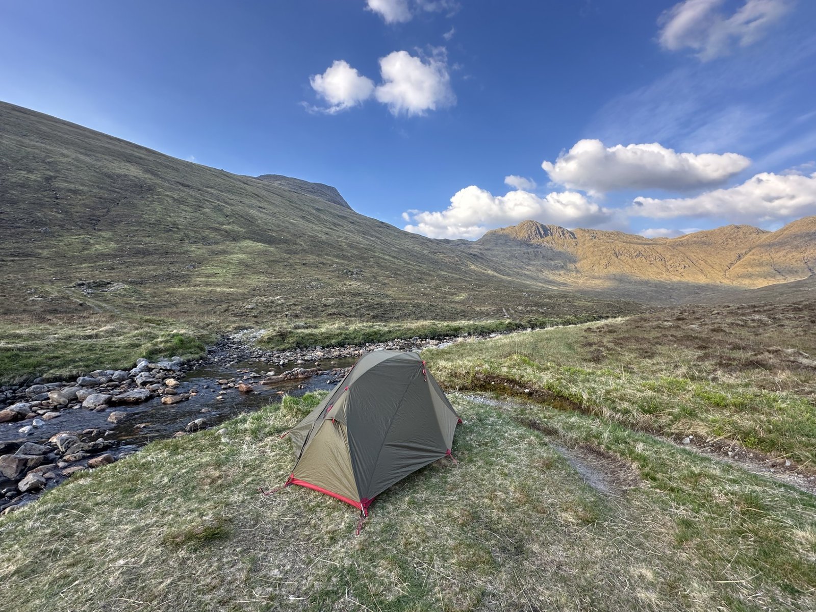 Camping next to a river (Allt a’Coire Reidh) on the Cape Wrath Trail